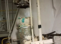 一例某轮应急消防泵吸入管穿过机舱未设坚固钢质外壳的缺陷探讨